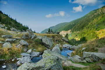 September landscape of the Fagaras Mountains, Romania. A view from the hiking trail near the Balea Lake and the Transfagarasan Road