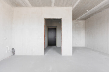 interior of the apartment without decoration in gray colors. rough finish
