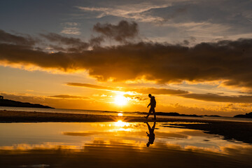 Fototapeta na wymiar sunset on Trearddur Bay Beach, Anglesey Uk