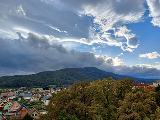 large clouds over Pohorje Mountains. Slovenia. Maribor. Autumn. Overcast.