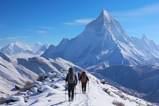 Beautiful winter landscape scenery with climbers hikers enjoying the view.