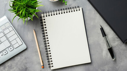 Blank notepad on gray desktop. Education, text, copy space concept 