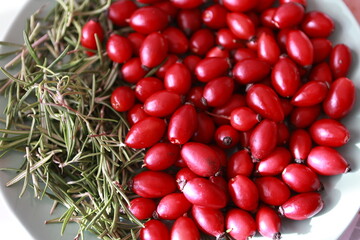 Rosehip and rosemary on the plate.