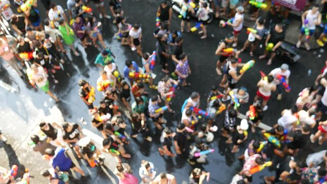 Songkran in Thailand, Traditional Thai New Year Festival. Songkran is inscribed as the UNESCO&rsquo;s Intangible Cultural Heritage event for Humanity from Thailand. People play water and use water guns.