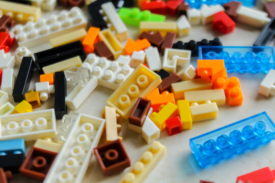 pile of colorful Lego blocks. Top angle view of lego bricks on white background