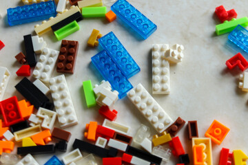 Fototapeta na wymiar pile of colorful Lego blocks. Top angle view of lego bricks on white background