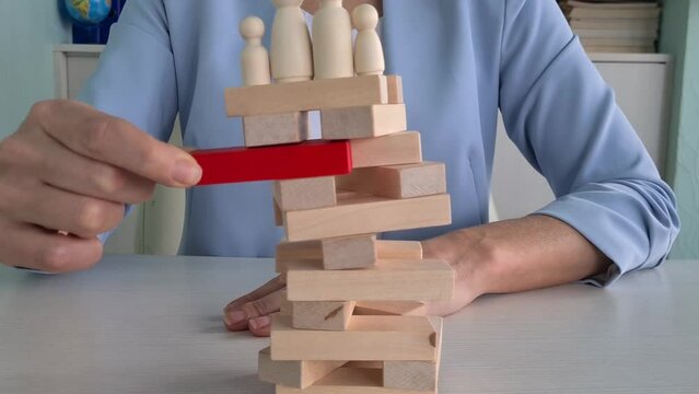Family with children on tower falls. Divorce quarrel separation of children and parents and divorce