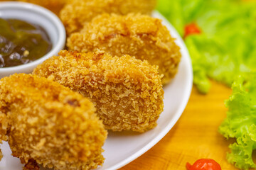 Porção de Frango Frito