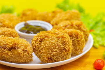 Porção de Frango Frito