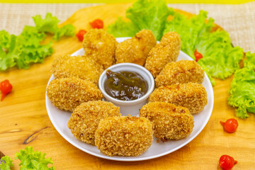 Porção de Frango Frito