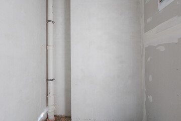 interior of the apartment without decoration in gray colors. rough finish