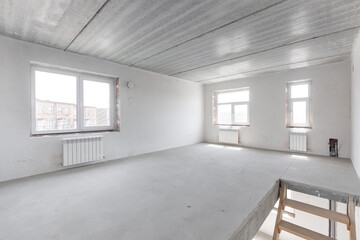 interior of the apartment without decoration in gray colors. rough finish