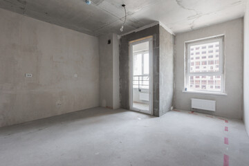 interior of the apartment without decoration in gray colors. rough finish