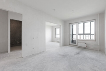 interior of the apartment without decoration in gray colors. rough finish