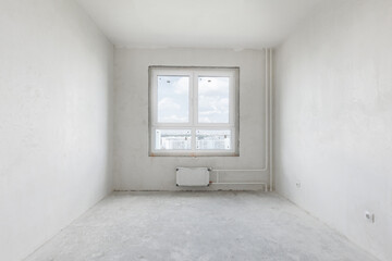 interior of the apartment without decoration in gray colors. rough finish