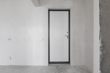 interior of the apartment without decoration in gray colors. rough finish