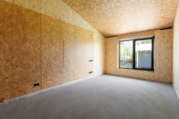 interior of the apartment without decoration in gray colors. rough finish