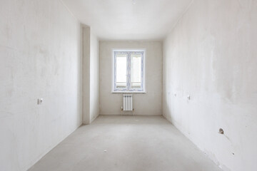 interior of the apartment without decoration in gray colors. rough finish