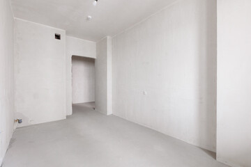 interior of the apartment without decoration in gray colors. rough finish