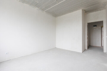 interior of the apartment without decoration in gray colors. rough finish