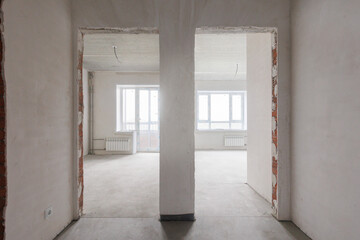 interior of the apartment without decoration in gray colors. rough finish