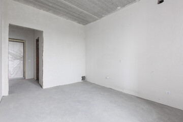 interior of the apartment without decoration in gray colors. rough finish