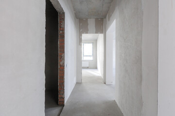 Fototapeta premium interior of the apartment without decoration in gray colors. rough finish
