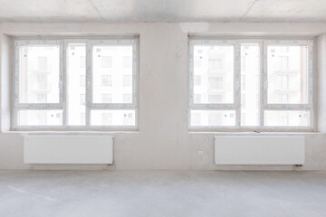 interior of the apartment without decoration in gray colors. rough finish