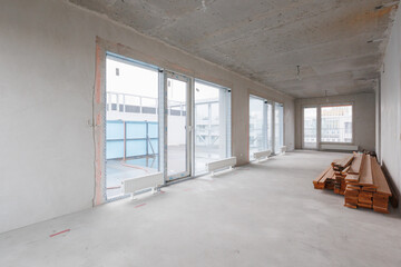 interior of the apartment without decoration in gray colors. rough finish
