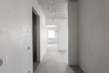 interior of the apartment without decoration in gray colors. rough finish