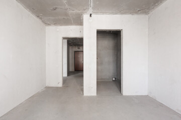interior of the apartment without decoration in gray colors. rough finish