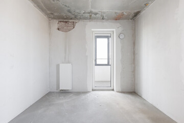 interior of the apartment without decoration in gray colors. rough finish