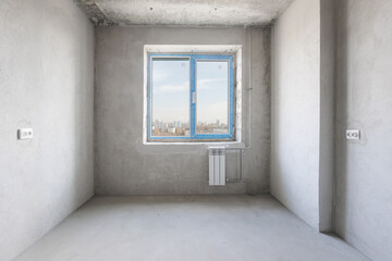 interior of the apartment without decoration in gray colors. rough finish