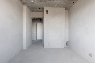 interior of the apartment without decoration in gray colors. rough finish