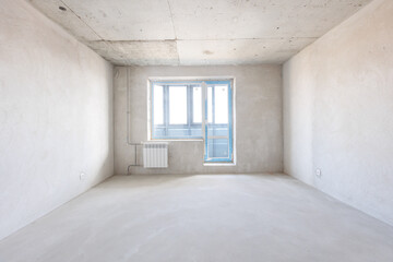 interior of the apartment without decoration in gray colors. rough finish