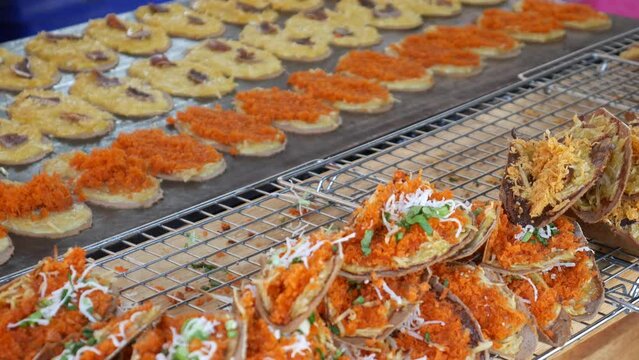 Making Khanom Buang (Thai crispy pancakes or crispy crepes), Traditional Thai snack