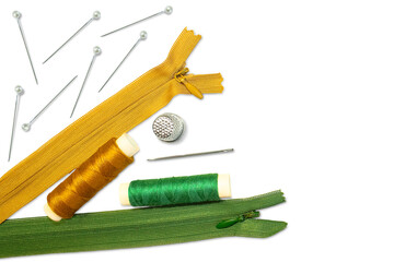 Two sewing zippers, two skeins of thread, a needle and a thimble isolated on a transparent background.