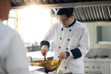 portrait asian thai male chef. Cooking class. culinary classroom. cooking school. cooking lessons...