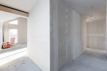 interior of the apartment without decoration in gray colors. rough finish