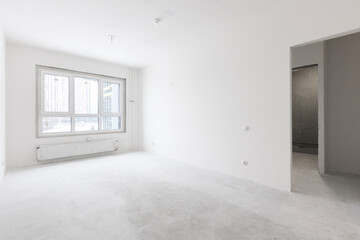 interior of the apartment without decoration in gray colors. rough finish