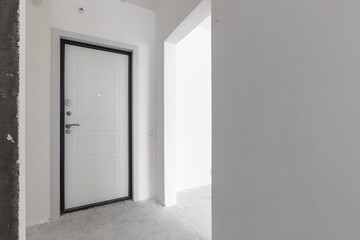 interior of the apartment without decoration in gray colors. rough finish