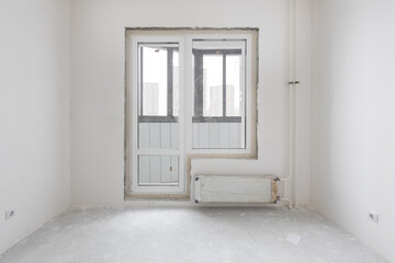 interior of the apartment without decoration in gray colors. rough finish