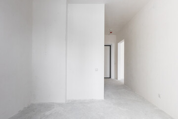 interior of the apartment without decoration in gray colors. rough finish