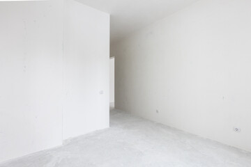interior of the apartment without decoration in gray colors. rough finish