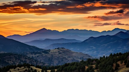 Rocky mountain range glowing under the warm tones of a sunset