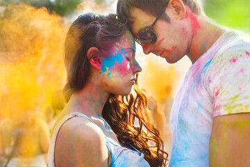 Couple in love on holi color festival
