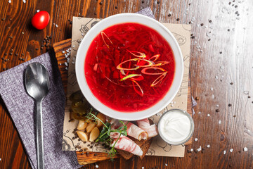 cold borscht with pieces of bacon, garlic and , dark and moody, top new