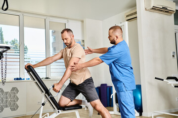 professional instructor supporting man in sportswear during recovery training on exercise machine