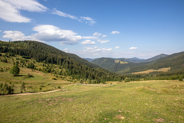 Fototapeta na wymiar Landscape of the Ukrainian Carpathians against the sky with clouds in summer