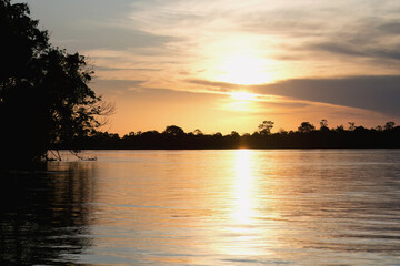 Fototapeta na wymiar Sunset on Amana River, an Amazon tributary, Amazonas state, Brazil